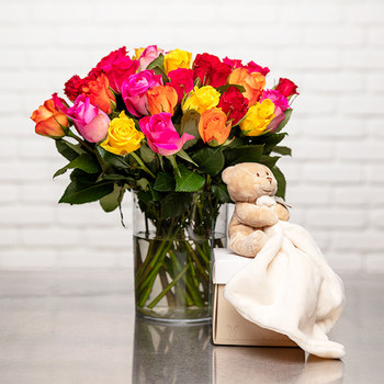 Bouquet de roses et doudou ours