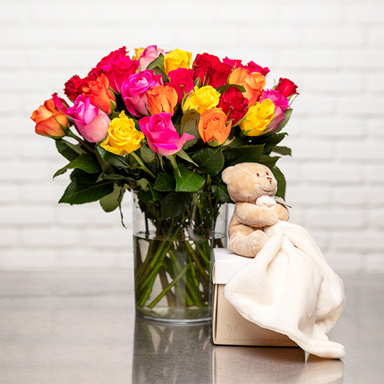 Bouquet de roses et doudou ours
