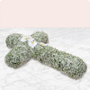 Funeral, memorial service, religious tribute, remembrance. A simple and elegant floral cross to express eternal love.