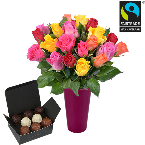Roses, vase, chocolates and daffodils 