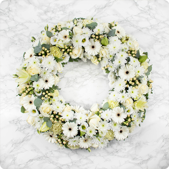Same day delivery available with the  Serenidad Funeral Wreath